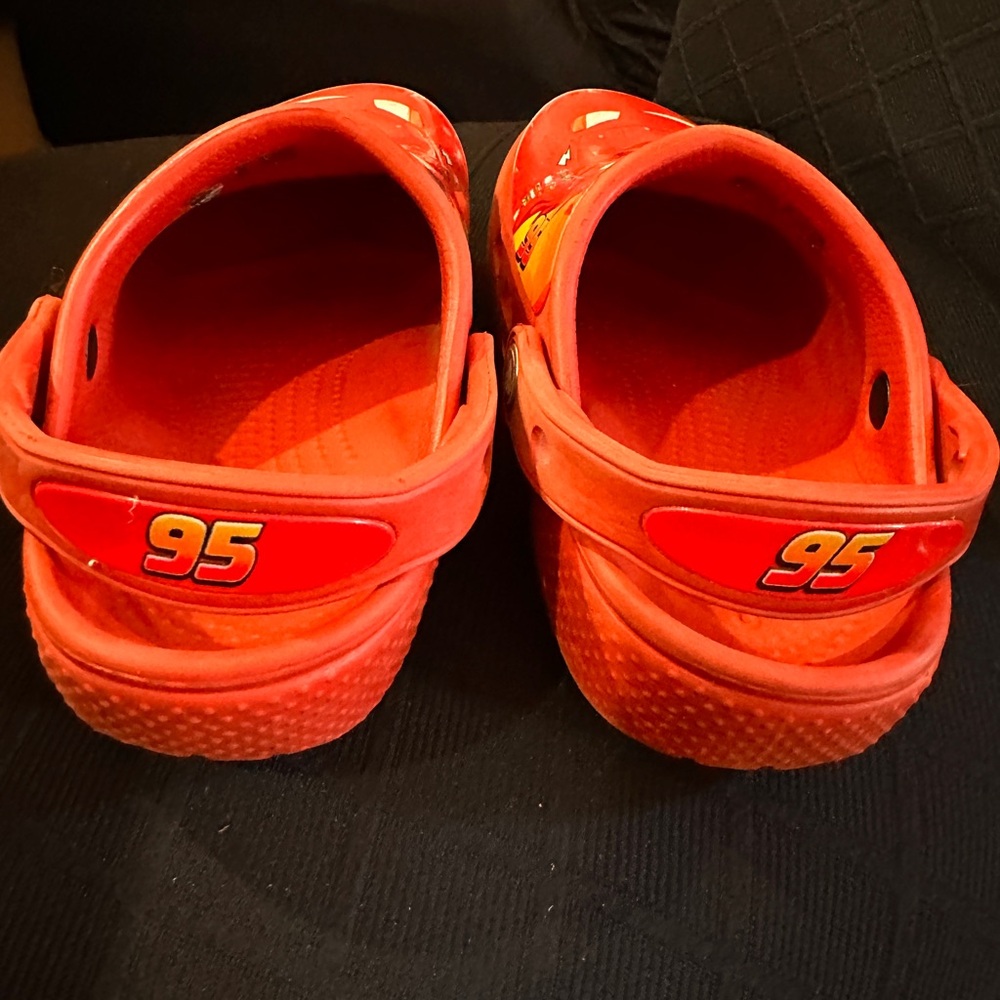 Used play condition w/alot of life left Needs a scrub lightning McQueen crocs